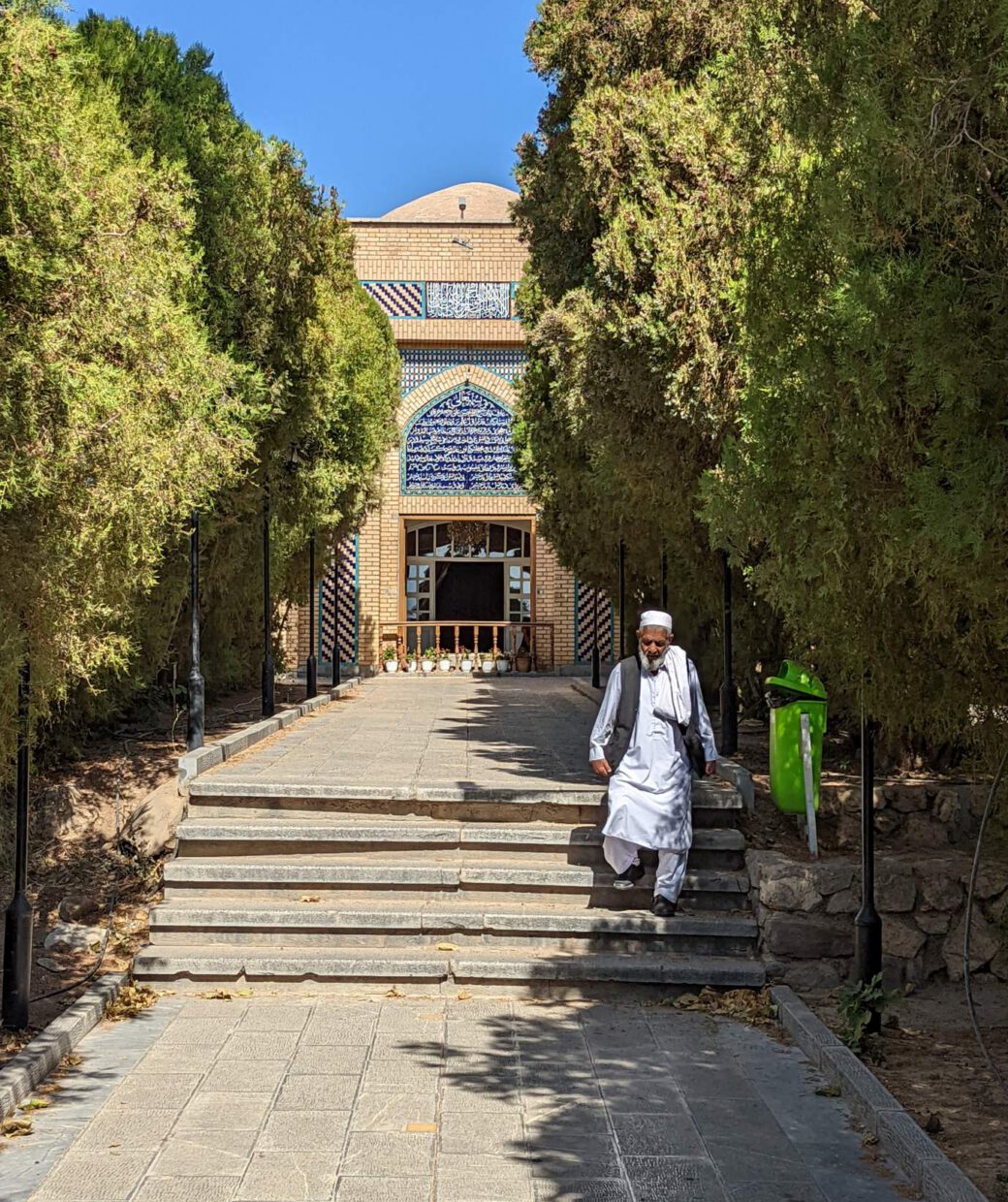 Pilgrim descending the steps at Kharaqan shrine, Iran